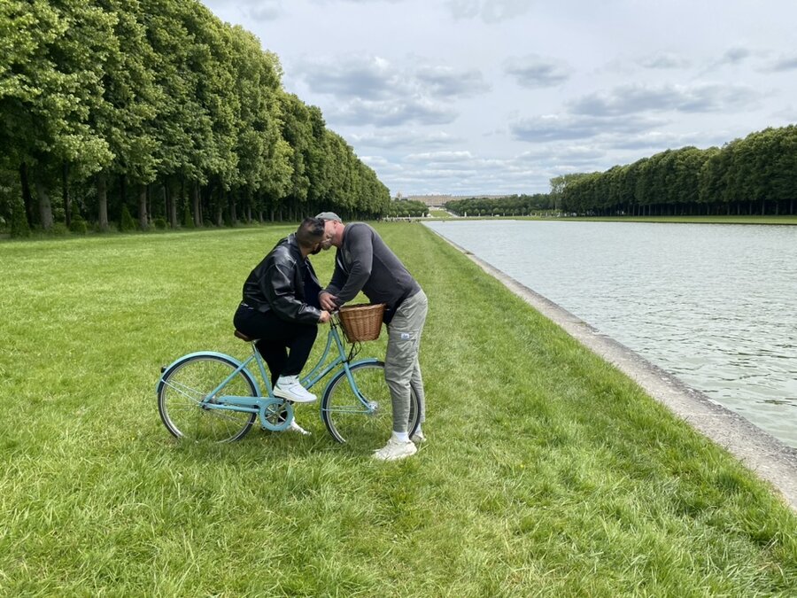 Court and Daniel checking bike together